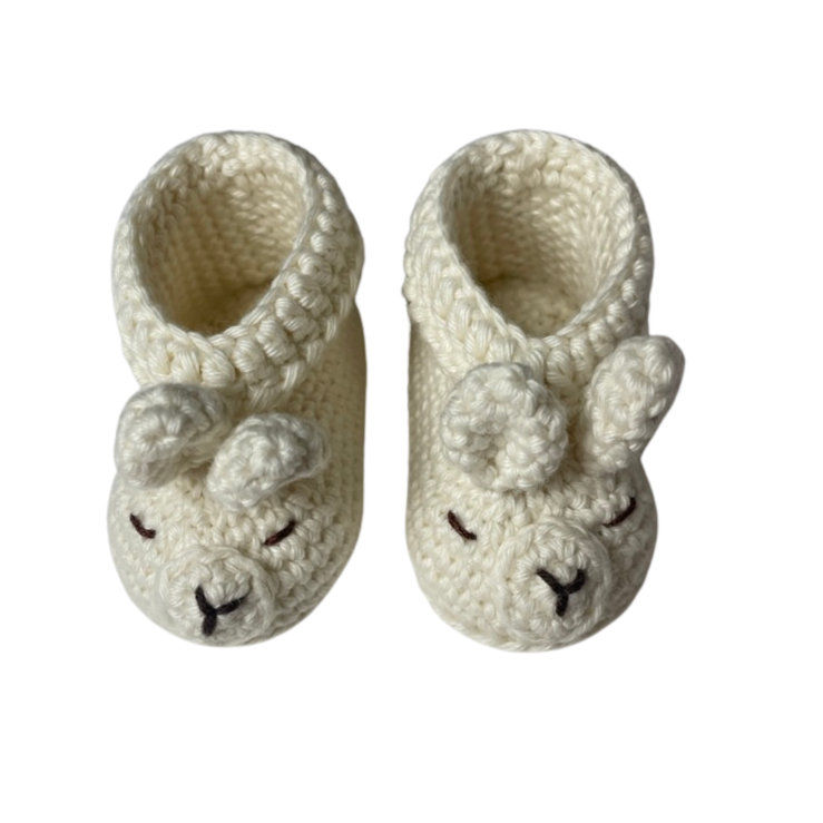 Dbaby Cuzco These Ivory llama Shoes are perfect for your little one's delicate feet.
