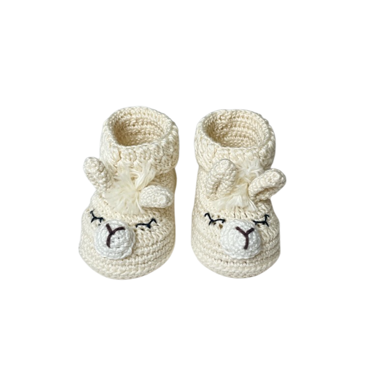 Dbaby Cuzco These Ivory llama Shoes are perfect for your little one's delicate feet.