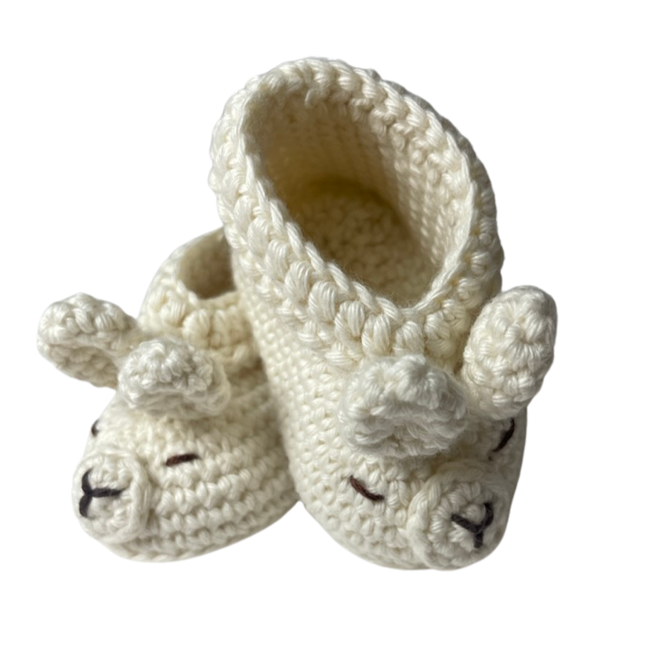 Dbaby Cuzco These Ivory llama Shoes are perfect for your little one's delicate feet.